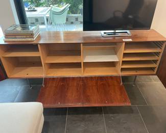 Shown with all four storage compartments open. All shelves are adjustable.