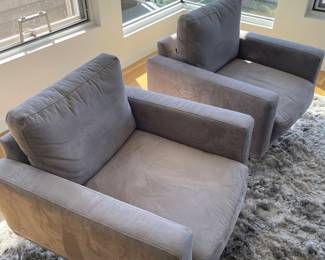 $1,200 pair of BoConcept grey ultra suede swivel club chairs. 31”w X 31”d X 32”h.