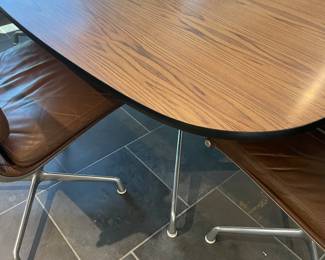 Another view of the table showing the base and the base of the chairs.