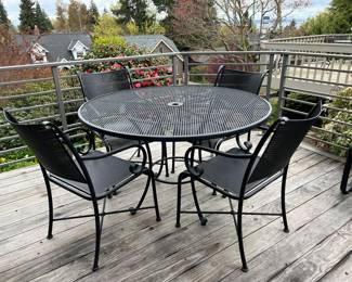 $1000 Summer Classics48” mesh, 8 spoke wrought iron table and 4 wrought iron mesh arm chairs
$2,000 new plus tax and shipping! available for online purchase only please inquire if you have questions