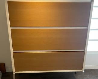 $360 European design three-tiered storage unit. This piece can be used for storage or a display piece (shown in next photo)54.25”w X 15”d X 63”h. Comes apart into four pieces for easy moving.