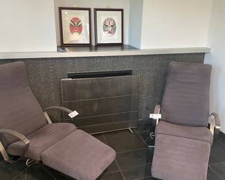 Another view of the pair of reclining chairs and matching Ottomans, available for purchase in a separate photo.