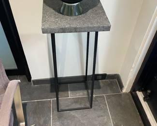 $90 Flamed finish granite and metal table. 12” sq. X 31.5”h