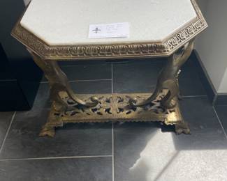 $180 Bronze cast base with marble top. 22”w X 17”d X 19.5”h . (As found)