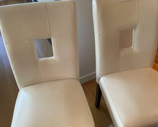 $240 set of four faux leather dining chairs. 18.5w X 19d X 37.5h