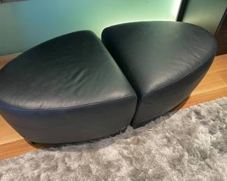 $380 Pair of Calia Italia black leather ottomans. Great for extra seating. 23”w X 23.5”d X 16”h