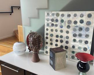 Art objects available for in person purchase. Large piece in the back is sold in a separate photo.