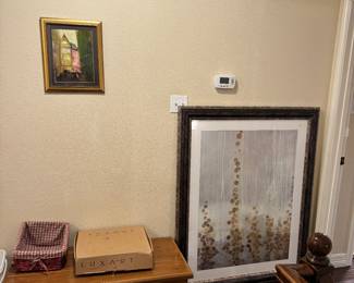 Hope chest new bathtub faucet, custom framed artwork. 