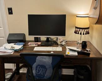 Brown wooden desk from Star Furniture. 
