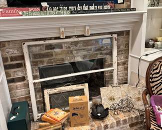 Artwork, old stainglass window, decorative items. 