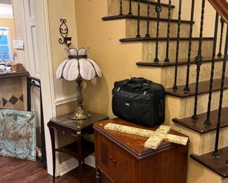 More antique furniture, granite cross. 