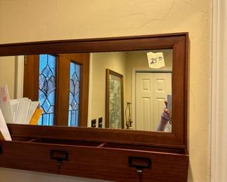 Pottery barn mail slot holder on wall. 