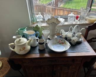 Yes pot on left front corner is SOLD