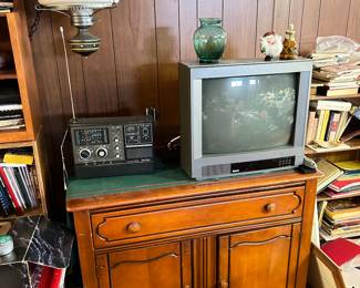 Vintage hanging lamp
Cabinet 
Radio
TV
