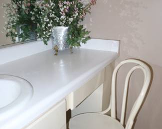 A pair of old bentwood ice cream chairs, painted