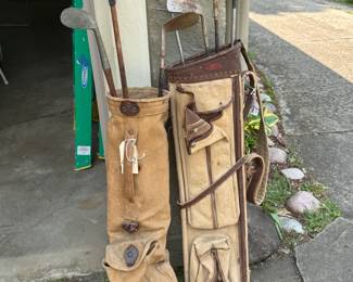 Vintage golf clubs and bags