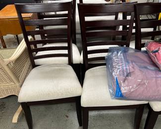 6 dark wood chairs with padded seats $150
