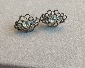 Vintage silver earrings with crystals in middle 
