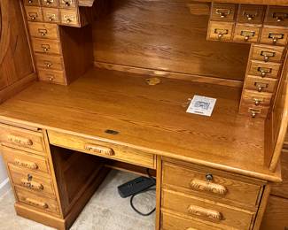 Vintage roll top desk.  Very sturdy piece. bring help to move and be amazed at the price 