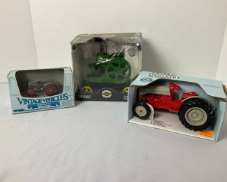 3 ERTL Die Cast Tractors 