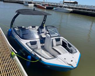 Yamaha 212 X. One owner. Less than 30 hours on the twin and board jet engines.