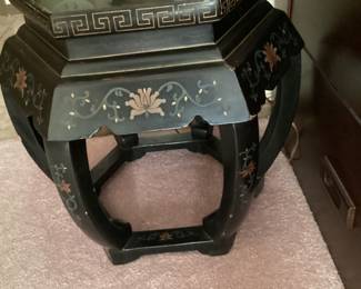 A pair of Chinese black lacquered night stands