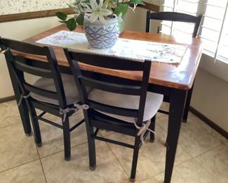 Black Lacquered kitchen table with four chairs