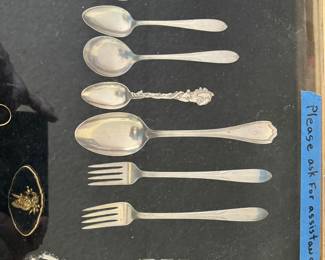 Sterling silver flatware, jewelry, pin, and a 14 karat gold ladies ring