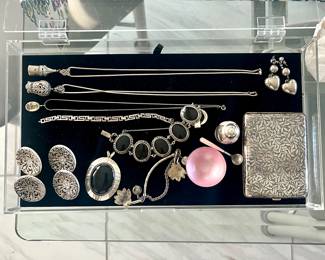 A variety of Sterling/925, including a cigarette case, buttons, pendants, chains, bracelets and a vintage salt and pepper