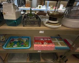 portable ice crusher, kitchen scale, Smurf tray, child's tea set