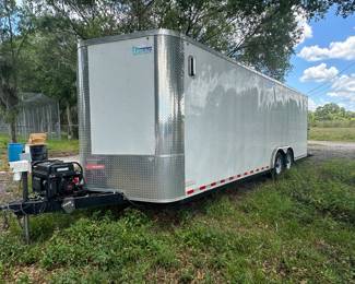 28’ enclosed air conditioned trailer with generator, security cameras, etracks and straps, co2 monitor, shop lights and spare tires $12,000