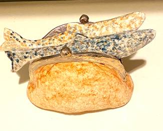 Porcelain “leather” bag with fish sculpture