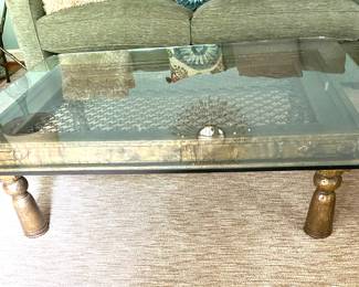 Antique hammered metal window frame made into coffee table