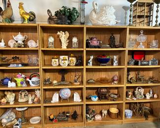 4 Bookcases for sale and filled with Collectibles