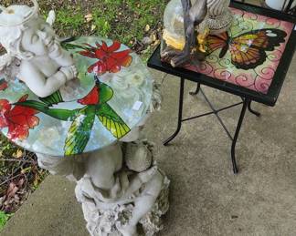 Glass outdoor side tables and plant stands
