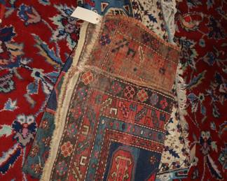 Several antique rugs