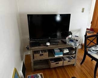 TCL flat screen TV, TV stand, Blu-ray DVD player, TV Stand