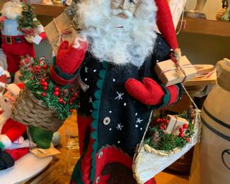 #166 Den- Art Lynn Haney Collection # 1017 in 1997 Santa Statue - Santa w/canoe & Basket $120.00