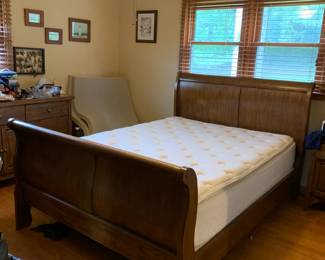 #4	queen oak sled bed with mattress set from Denver mattress 	 $275.00 
