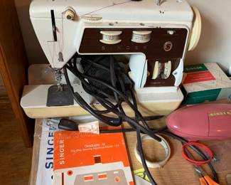 #70 Singer Graduate 2 - Cast iron w/orig. manual $20.00