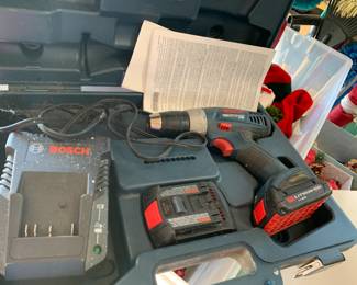 #152 Bosch battery operated drill w/charger & Case $75.00