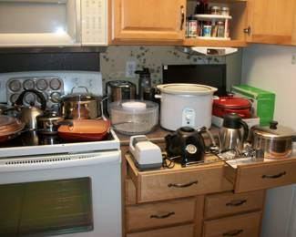 small appliances, spices, cookware, electric knifesharpener
