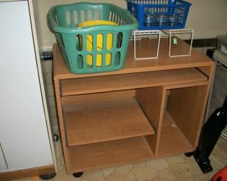 computer desk, plastic clothes basket