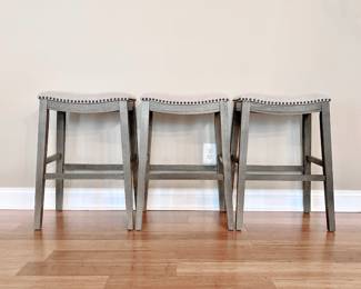 SET OF 3 GRAY UPHOLSTERED 28" SADDLE STYLE BARSTOOLS - TACK ACCENTS