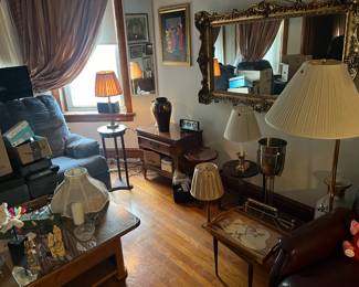 Gorgeous Brass Lamps , Vintage Large Hanging Mirror, end tables , brick and black