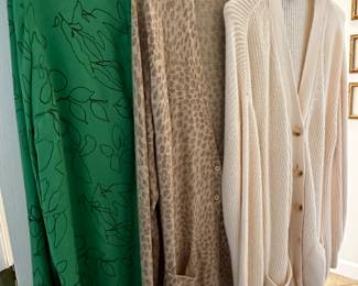 Large light weight sweaters. Great for ding out !!