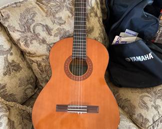 Yamaha Guitar with case & book 