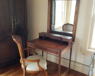 Wall mirror; cane back upholstered chair. Sorry, writing desk is sold.