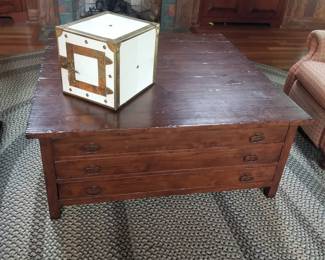Porcelain cigar safe; large rustic 3-drawer coffee table 