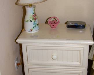 White nightstand and colorful lamp